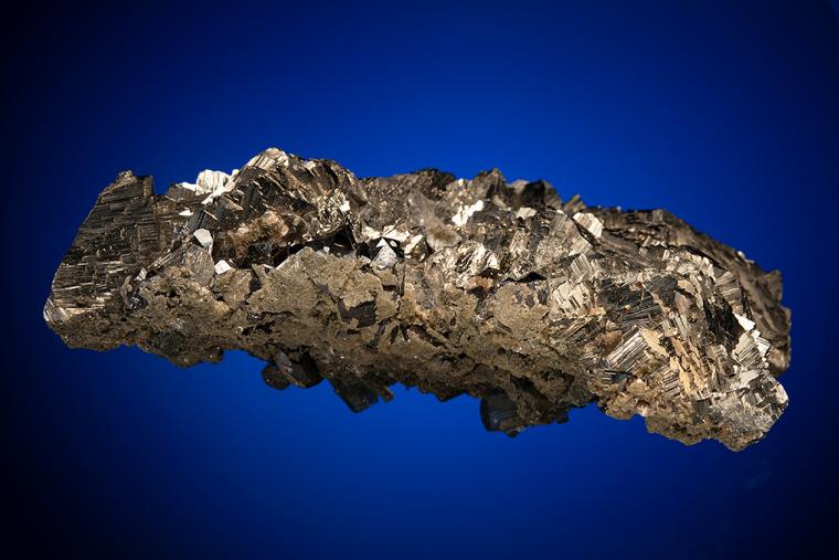 CASSITERITE and FLUORAPATITE on ARSENOPYRITE