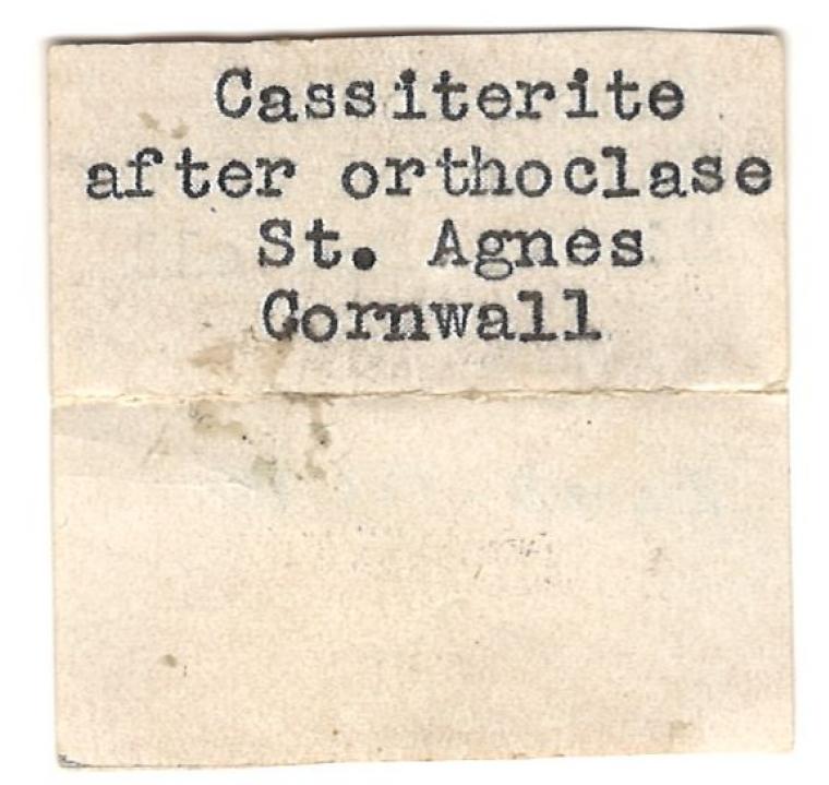 CASSITERITE after ORTHOCLASE