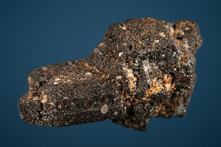 CASSITERITE after ORTHOCLASE