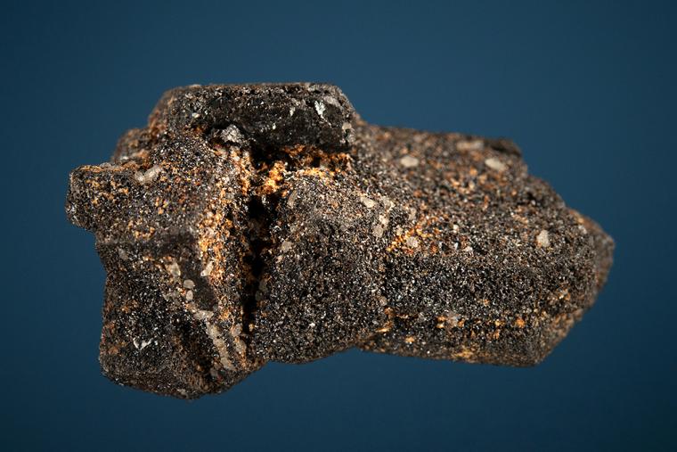 CASSITERITE after ORTHOCLASE