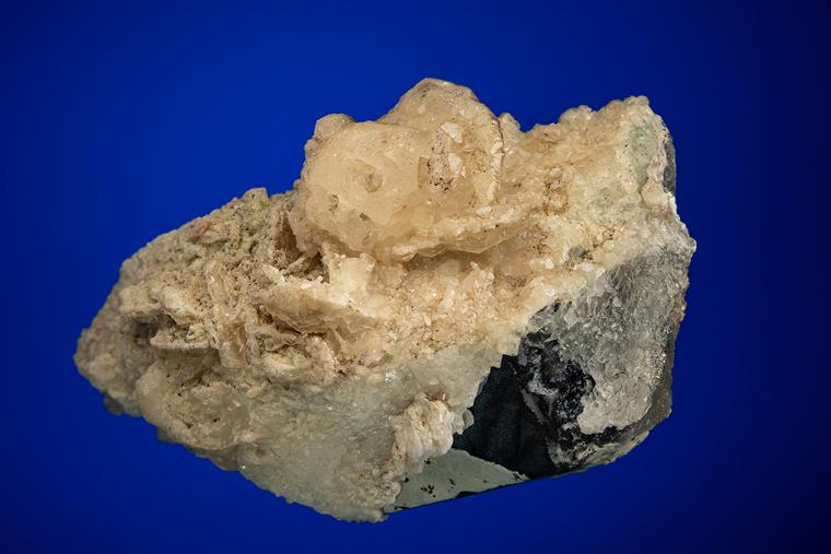 CALCITE on QUARTZ var. Smoky