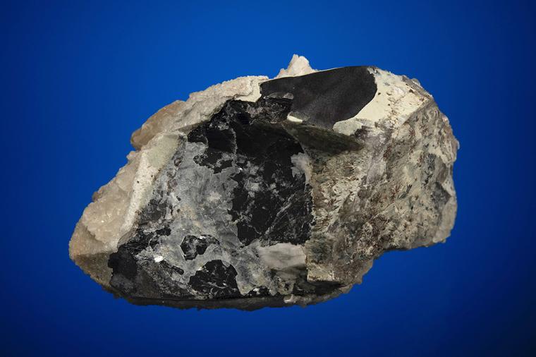 CALCITE on QUARTZ var. Smoky