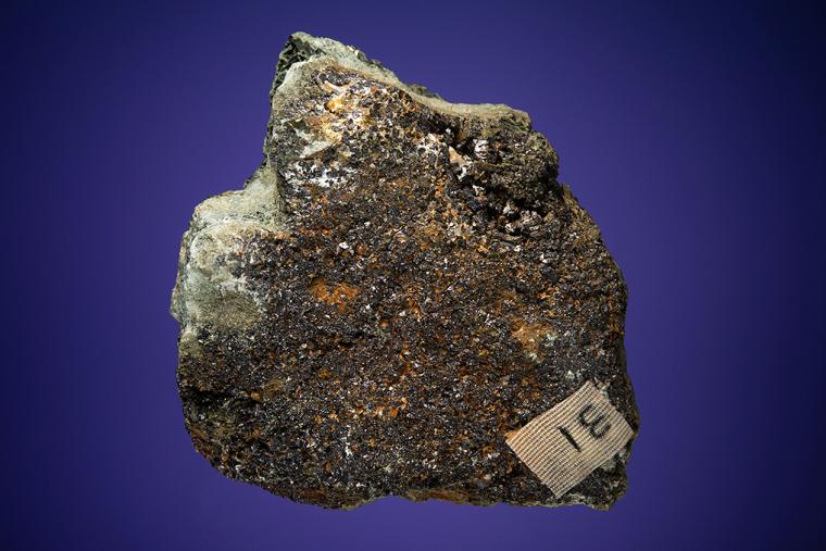 PYRITE with MAGNETITE on ACTINOLITE after DIOPSIDE 