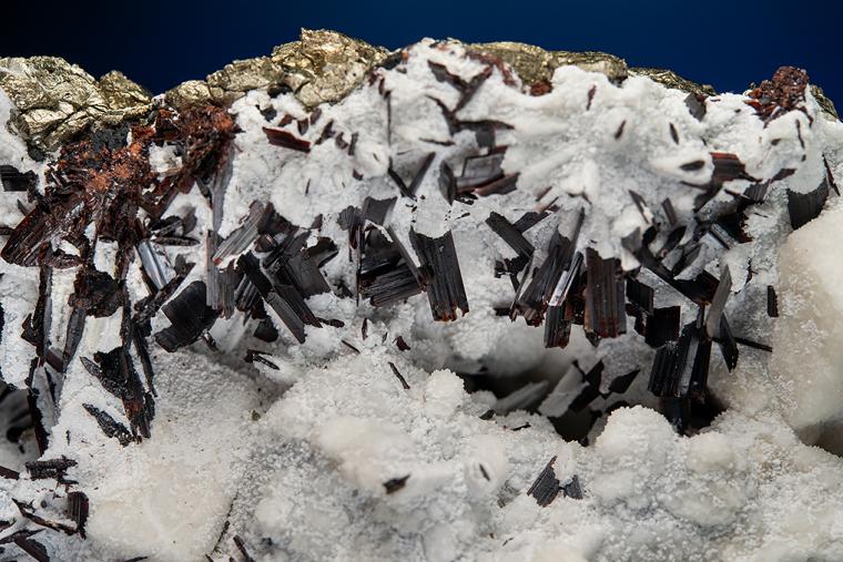 HÜBNERITE with QUARTZ on PYRITE