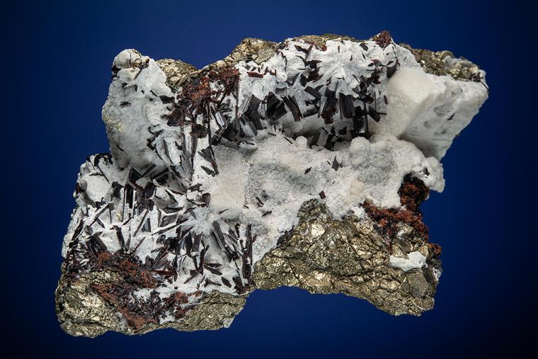 HÜBNERITE with QUARTZ on PYRITE