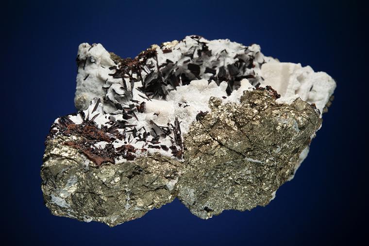HÜBNERITE with QUARTZ on PYRITE