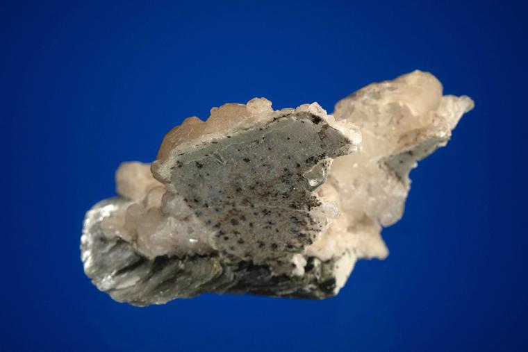 CALCITE on MUSCOVITE