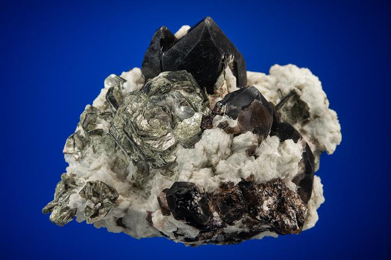 MUSCOVITE on QUARTZ var. Smoky and ALBITE