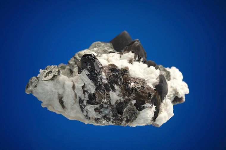 MUSCOVITE on QUARTZ var. Smoky and ALBITE