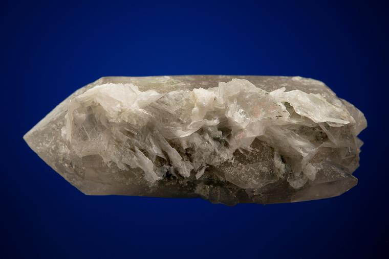 TITANITE and ALLANITE-(Ce) with CALCITE on QUARTZ