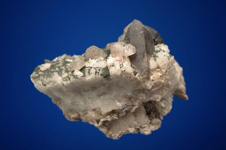FLUORAPATITE with QUARTZ var. Smoky on MICROCLINE