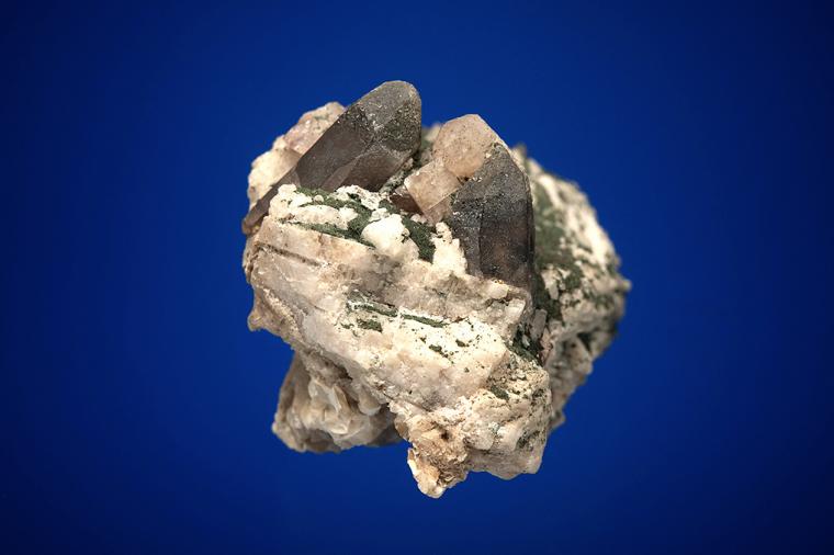 FLUORAPATITE with QUARTZ var. Smoky on MICROCLINE