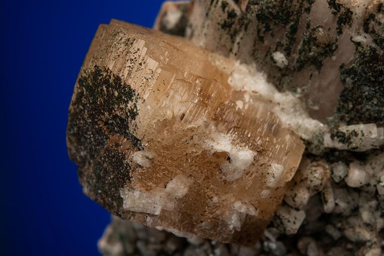 PHENAKITE with ALBITE on MICROCLINE