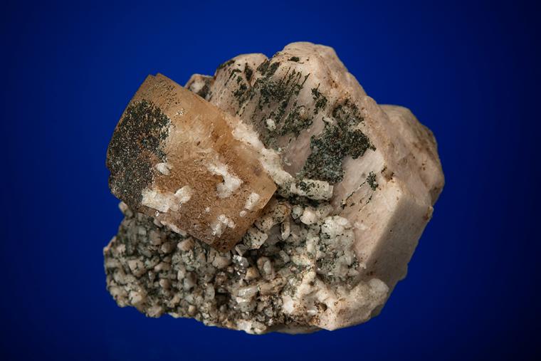 PHENAKITE with ALBITE on MICROCLINE