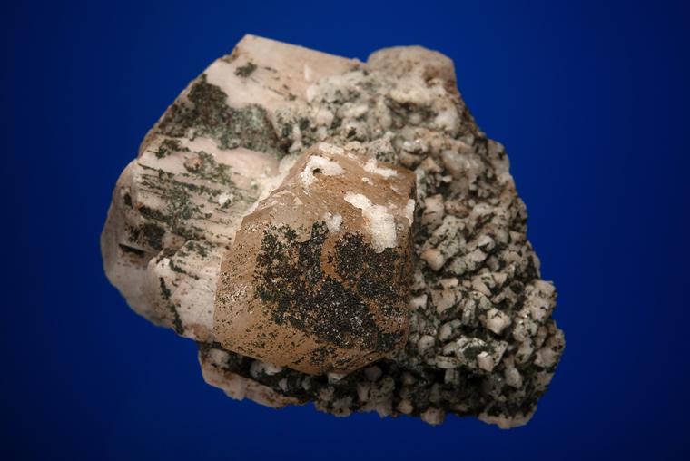 PHENAKITE with ALBITE on MICROCLINE
