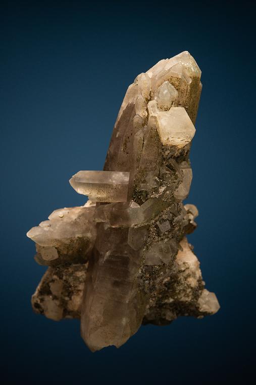 PHENAKITE on QUARTZ var. Smoky and MICROCLINE