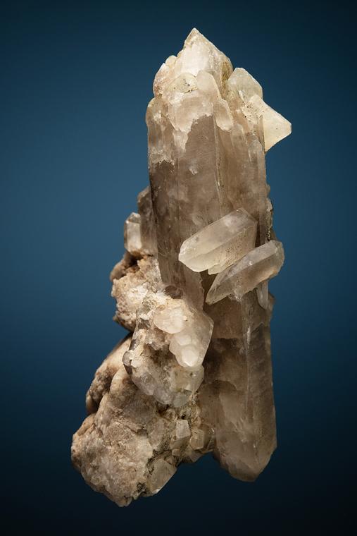 PHENAKITE on QUARTZ var. Smoky and MICROCLINE