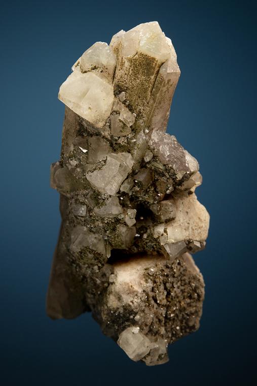 PHENAKITE on QUARTZ var. Smoky and MICROCLINE