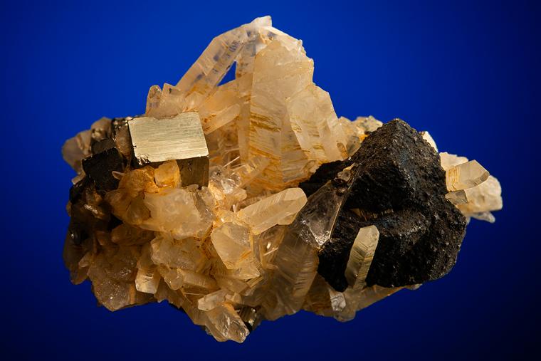 CHALCOPYRITE with PYRITE on QUARTZ