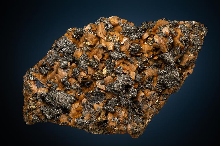 TENNANTITE on CHALCOPYRITE with SIDERITE