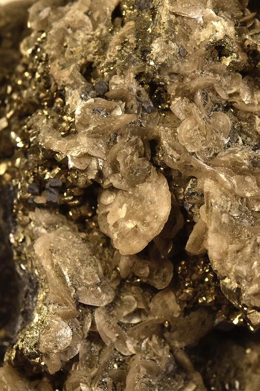 SIDERITE on PYRITE after PYRRHOTITE