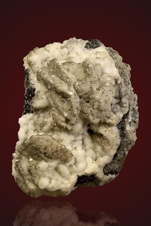 DOLOMITE after SIDERITE(?) with PYRITE on QUARTZ
