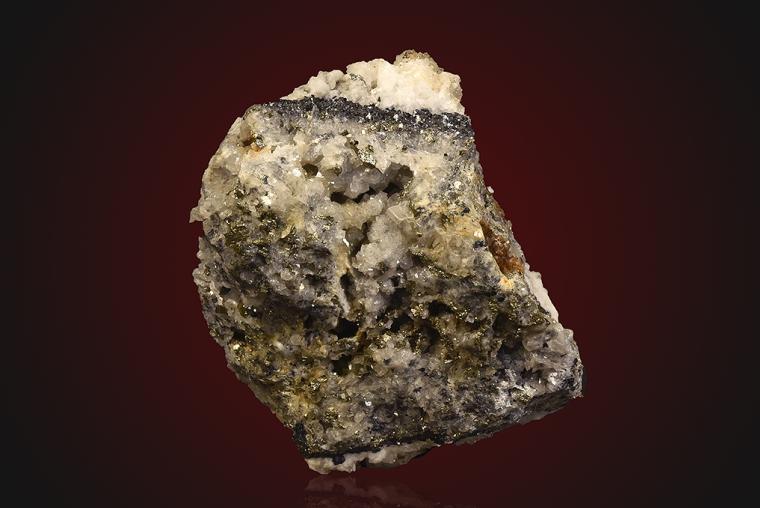 DOLOMITE after SIDERITE(?) with PYRITE on QUARTZ